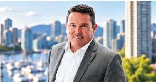 Chris Lotoski with Coal Harbour and the North Shore mountains behind him
